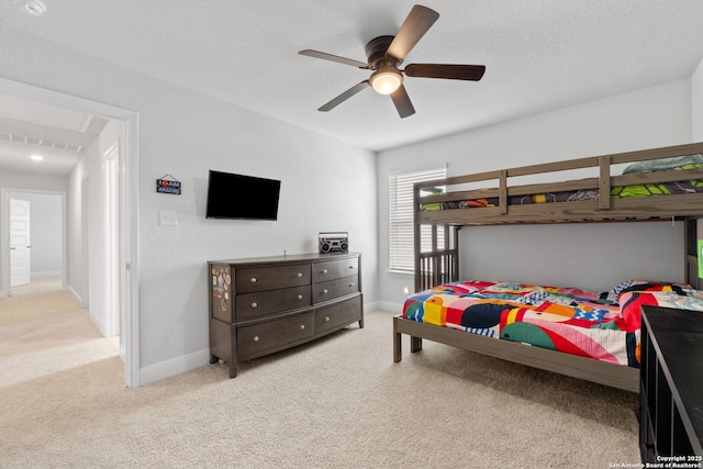 3415 Iron Cyn, Bulverde, TX 78163 - bedroom featuring carpet and a ceiling fan