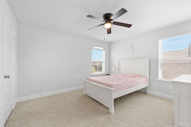 3415 Iron Cyn, Bulverde, TX 78163 - bedroom with light carpet and a ceiling fan