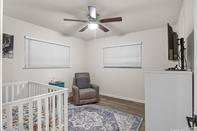 6402 Quiet Frst, San Antonio, TX 78239 - bedroom with wood finished floors, a nursery area, and ceiling fan