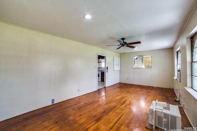 606 W Baetz Blvd, San Antonio, TX 78221 - spare room featuring ceiling fan and wood-type flooring