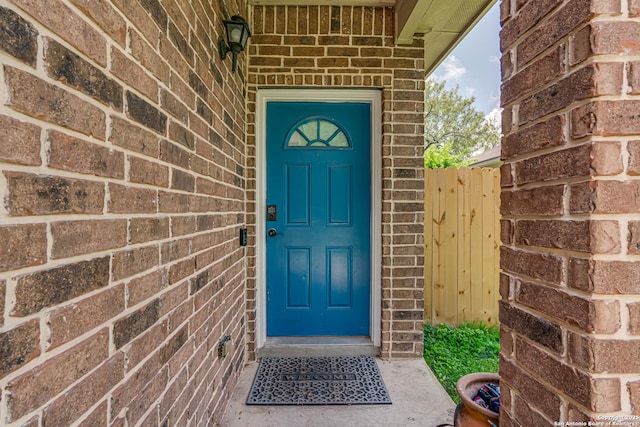 1038 Marquette, San Antonio, TX 78228 - doorway to property featuring brick siding