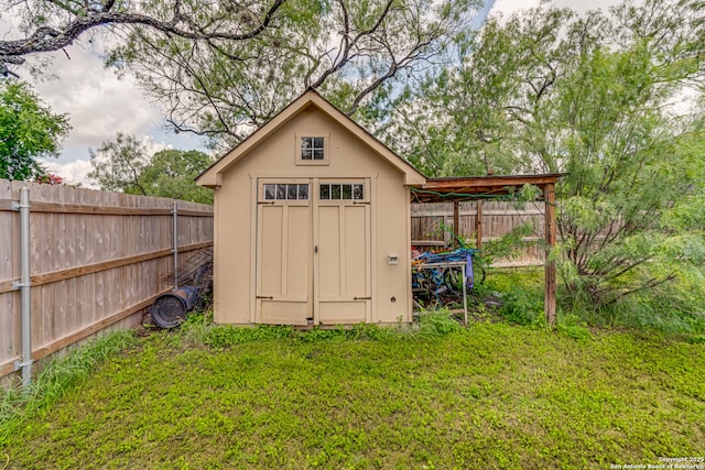 1038 Marquette, San Antonio, TX 78228 - view of shed featuring a fenced backyard