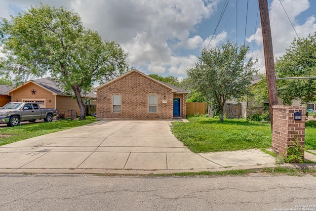 1038 Marquette, San Antonio, TX 78228 - view of front of property with brick siding and concrete driveway