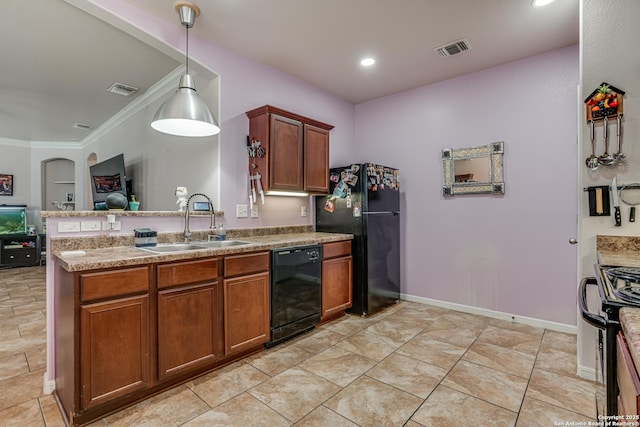 1038 Marquette, San Antonio, TX 78228 - kitchen featuring black appliances, a peninsula, decorative light fixtures, crown molding, and brown cabinets