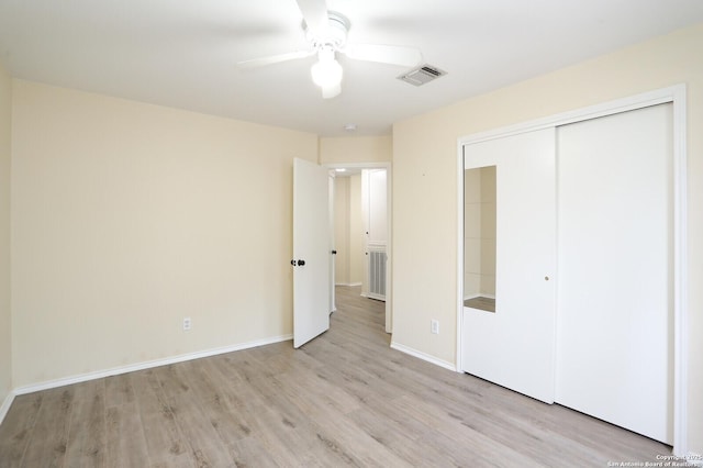 4239 Knollpass, San Antonio, TX 78247 - unfurnished bedroom featuring light wood-style flooring, a closet, and a ceiling fan