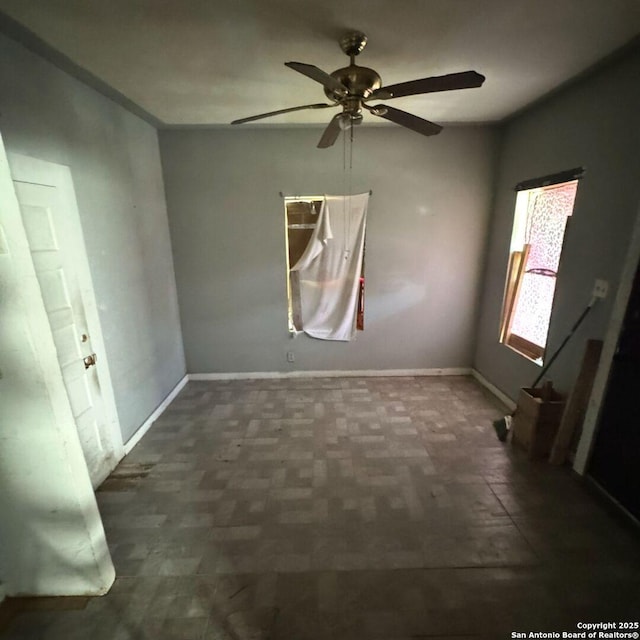 135 Roberts, San Antonio, TX 78207 - spare room featuring ceiling fan and baseboards
