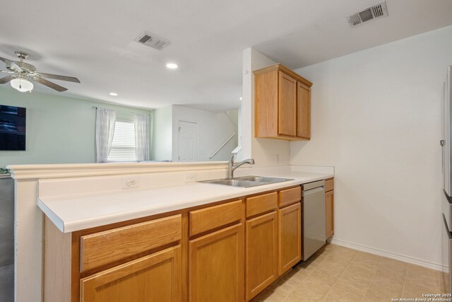 6410 Ruffled Grouse, San Antonio, TX 78233 - kitchen with stainless steel dishwasher, a peninsula, light countertops, a ceiling fan, and recessed lighting
