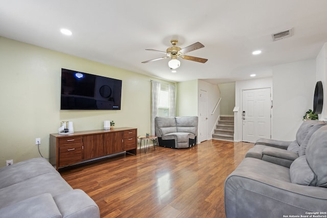 6410 Ruffled Grouse, San Antonio, TX 78233 - living area featuring stairs, ceiling fan, dark wood-style floors, and recessed lighting