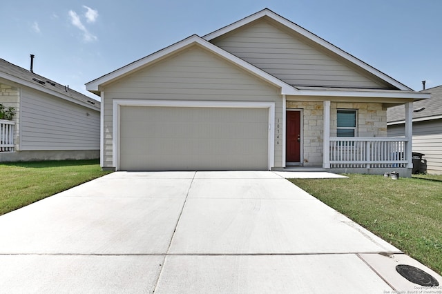 10746 Margarita Loop, Converse, TX 78109 - view of front facade featuring covered porch, an attached garage, driveway, stone siding, and a front yard