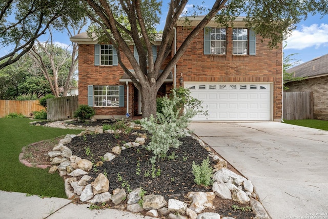 4707 Aspen Vw, San Antonio, TX 78217 - traditional home featuring concrete driveway, brick siding, and a garage