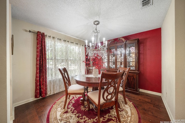 4707 Aspen Vw, San Antonio, TX 78217 - dining area featuring a chandelier, hardwood / wood-style flooring, and a textured ceiling