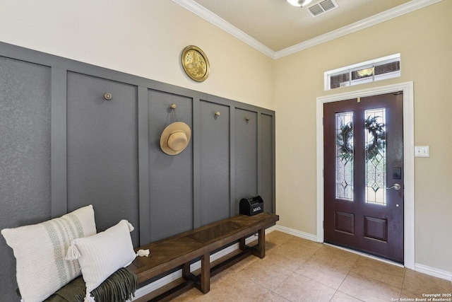 3403 Navajo Peace, San Antonio, TX 78261 - mudroom featuring crown molding, light tile patterned floors, and a decorative wall