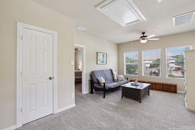 3403 Navajo Peace, San Antonio, TX 78261 - living area featuring attic access, ceiling fan, and light carpet