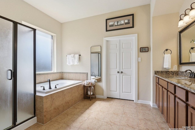 3403 Navajo Peace, San Antonio, TX 78261 - bathroom featuring a bath, vanity, a shower stall, and tile patterned floors