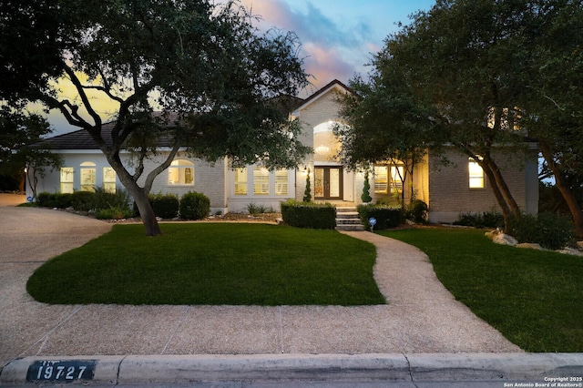 19727 La Sierra Blvd, San Antonio, TX 78256 - obstructed view of property with a front yard and brick siding