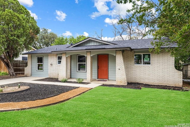 112 Meadow Way, Converse, TX 78109 - ranch-style home featuring brick siding, a porch, and a shingled roof