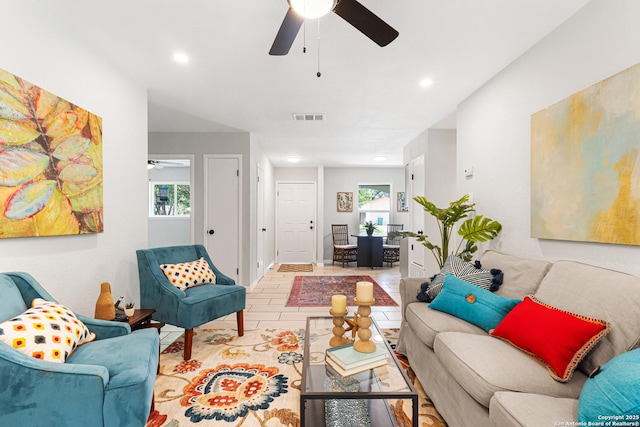112 Meadow Way, Converse, TX 78109 - living room with a ceiling fan and recessed lighting