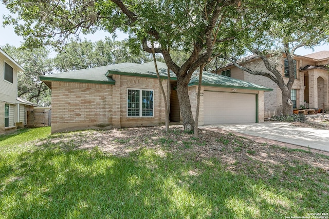8658 Quail Whisper, San Antonio, TX 78250 - view of front of house featuring brick siding, a garage, driveway, and roof with shingles