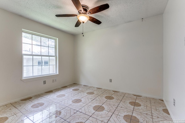 8658 Quail Whisper, San Antonio, TX 78250 - spare room featuring a textured ceiling and ceiling fan
