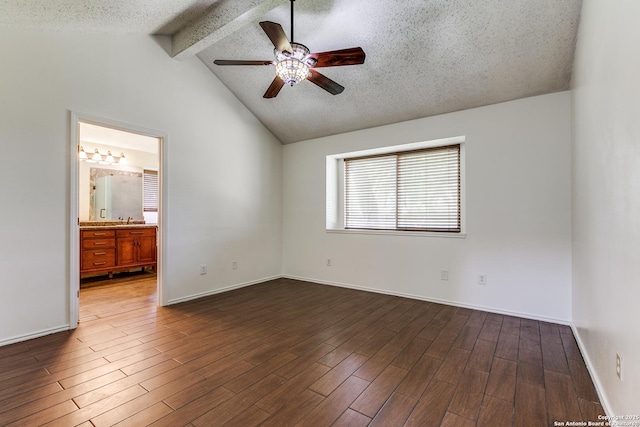 8658 Quail Whisper, San Antonio, TX 78250 - empty room with a ceiling fan, dark wood-style flooring, and a textured ceiling