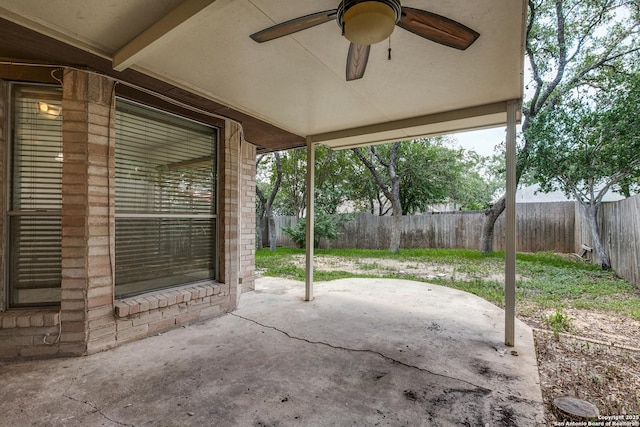 8658 Quail Whisper, San Antonio, TX 78250 - fenced backyard featuring a patio and a ceiling fan