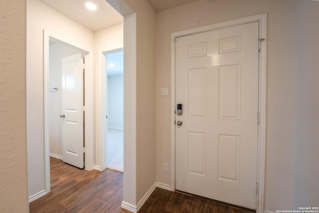 5722 Tanquil Cv, Converse, TX 78109 - entrance foyer with dark wood-type flooring and baseboards