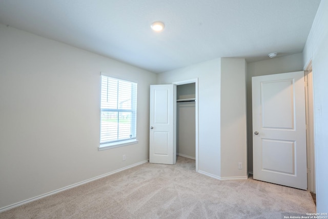 5722 Tanquil Cv, Converse, TX 78109 - unfurnished bedroom featuring light carpet and a closet