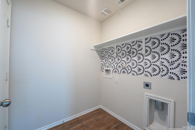 5722 Tanquil Cv, Converse, TX 78109 - laundry room featuring dark wood finished floors, electric dryer hookup, and hookup for a washing machine