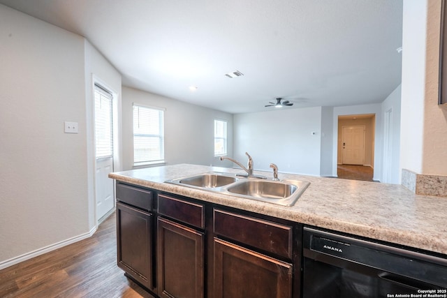 5722 Tanquil Cv, Converse, TX 78109 - kitchen featuring dishwasher, dark brown cabinets, wood finished floors, light countertops, and ceiling fan
