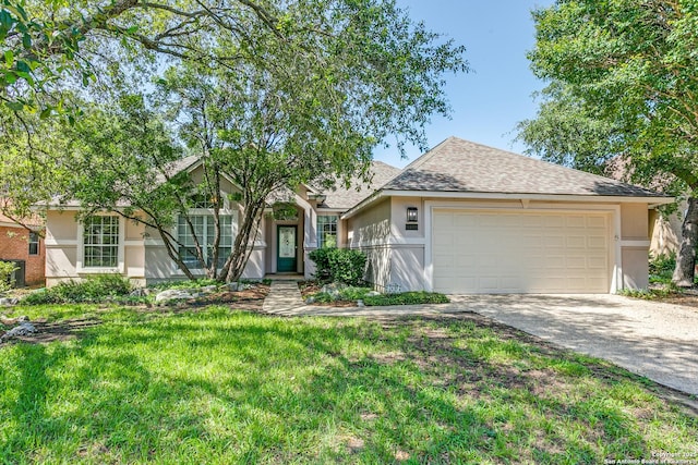 2430 Trace Oak, San Antonio, TX 78232 - view of front of home featuring stucco siding, driveway, a garage, a front lawn, and a shingled roof