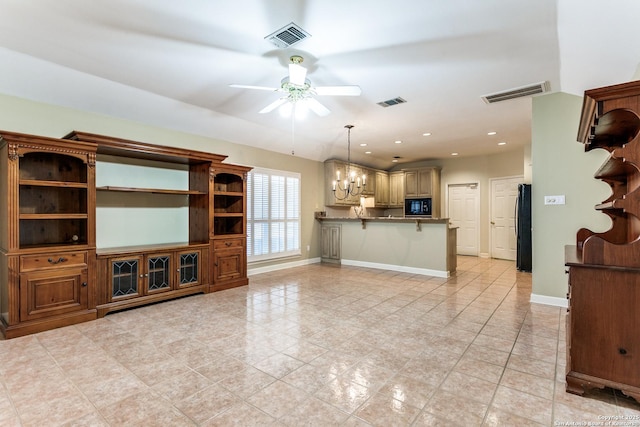 2430 Trace Oak, San Antonio, TX 78232 - unfurnished living room featuring a ceiling fan, light tile patterned floors, a chandelier, and recessed lighting