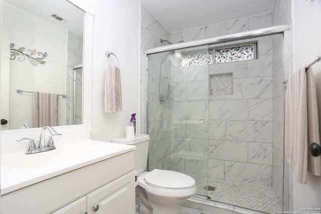 13111 Burgundy Pt, San Antonio, TX 78217 - bathroom featuring vanity and a marble finish shower