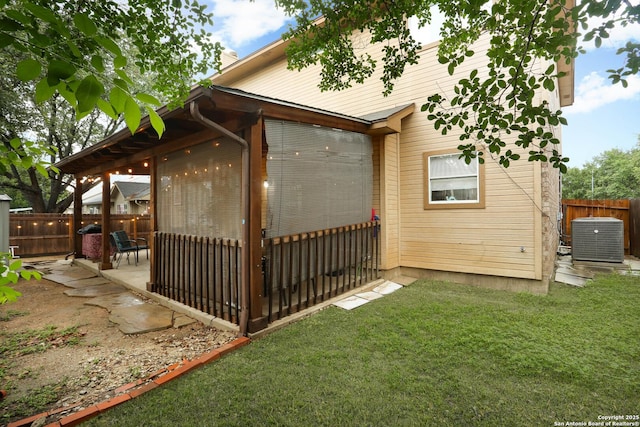 13111 Burgundy Pt, San Antonio, TX 78217 - view of side of home featuring a fenced backyard, a patio, and a chimney