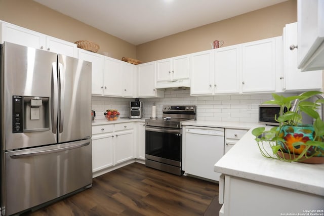 13111 Burgundy Pt, San Antonio, TX 78217 - kitchen featuring stainless steel appliances, under cabinet range hood, tasteful backsplash, and white cabinetry
