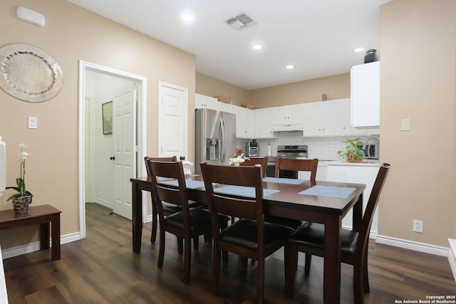 13111 Burgundy Pt, San Antonio, TX 78217 - dining area featuring dark wood-style floors and recessed lighting
