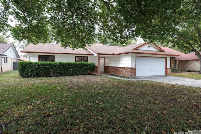 9238 Ridge Wilde, San Antonio, TX 78250 - single story home featuring a garage, concrete driveway, brick siding, a front lawn, and a shingled roof