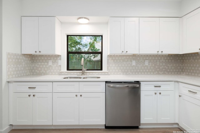 9238 Ridge Wilde, San Antonio, TX 78250 - kitchen with dishwasher, white cabinets, and light countertops