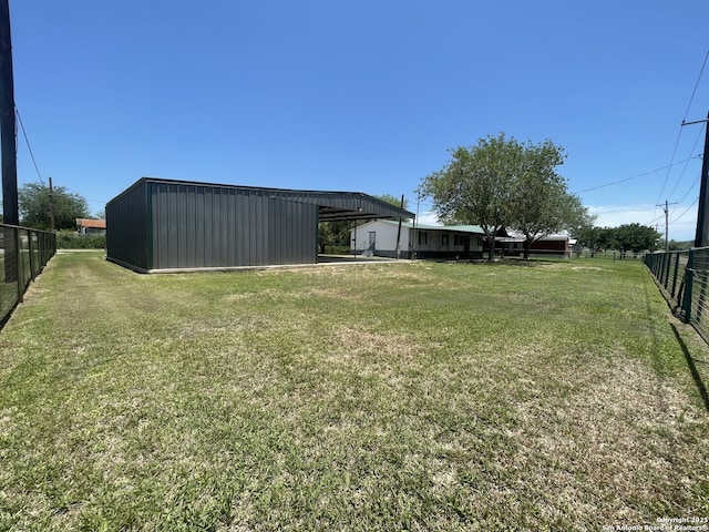 207 S Edwards, Charlotte, TX 78011 - view of yard featuring an outbuilding