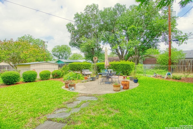 323 Hatcher Ave, San Antonio, TX 78223 - fenced backyard featuring a patio