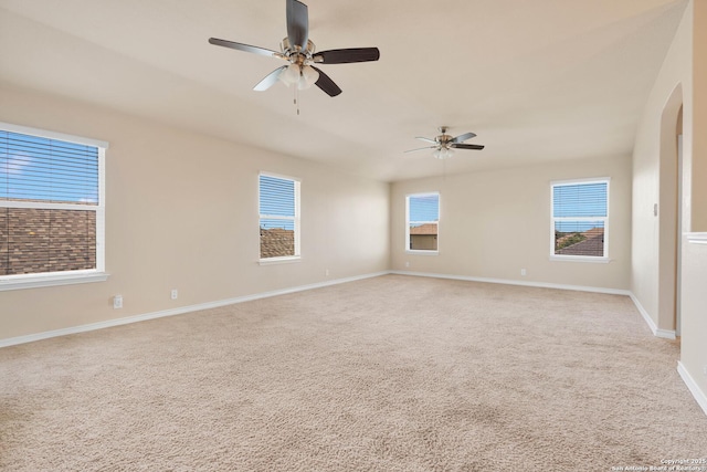 15442 Cooks Petrel, San Antonio, TX 78253 - spare room with light colored carpet, a ceiling fan, and arched walkways