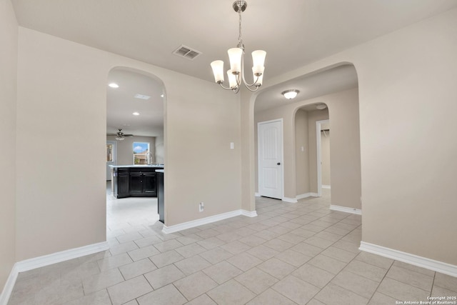 15442 Cooks Petrel, San Antonio, TX 78253 - empty room with arched walkways, a chandelier, ceiling fan, light tile patterned floors, and recessed lighting