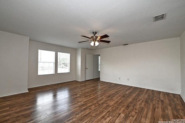 245 Gatewood, Cibolo, TX 78108 - empty room with dark wood finished floors, ceiling fan, and a textured ceiling