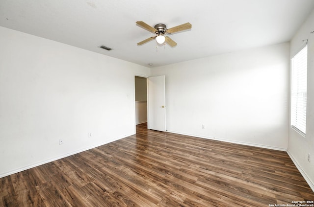 245 Gatewood, Cibolo, TX 78108 - spare room with ceiling fan, wood finished floors, and healthy amount of natural light