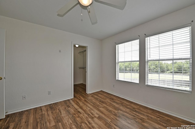 245 Gatewood, Cibolo, TX 78108 - unfurnished room featuring a ceiling fan and dark wood-type flooring