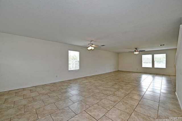 245 Gatewood, Cibolo, TX 78108 - empty room with a ceiling fan and light tile patterned floors