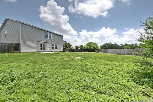 245 Gatewood, Cibolo, TX 78108 - fenced backyard featuring french doors