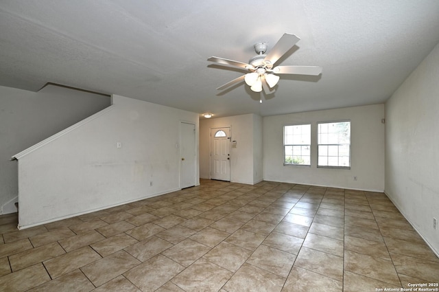 245 Gatewood, Cibolo, TX 78108 - empty room featuring a ceiling fan and light tile patterned floors