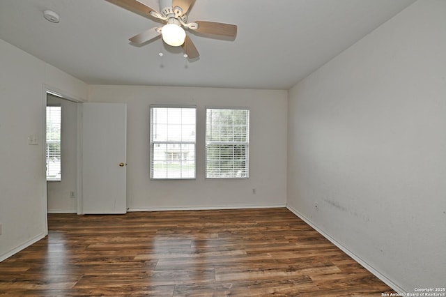 245 Gatewood, Cibolo, TX 78108 - empty room featuring dark wood-style floors, a ceiling fan, and a smoke detector