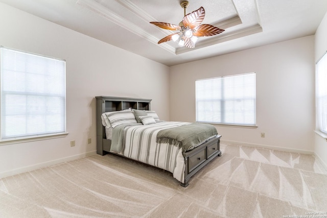 15311 Tamaron Pass, San Antonio, TX 78253 - bedroom with a raised ceiling, multiple windows, light colored carpet, and crown molding