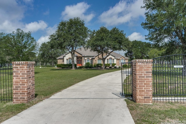 15311 Tamaron Pass, San Antonio, TX 78253 - view of front of home with a gate and driveway